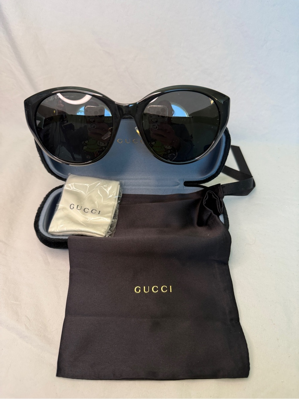 Gucci Black Cat-Eye Sunglasses with Dark Lenses